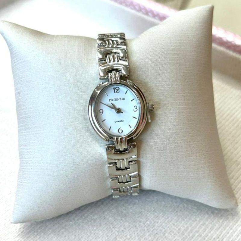 RELOGIO OVAL POTEN PRATA