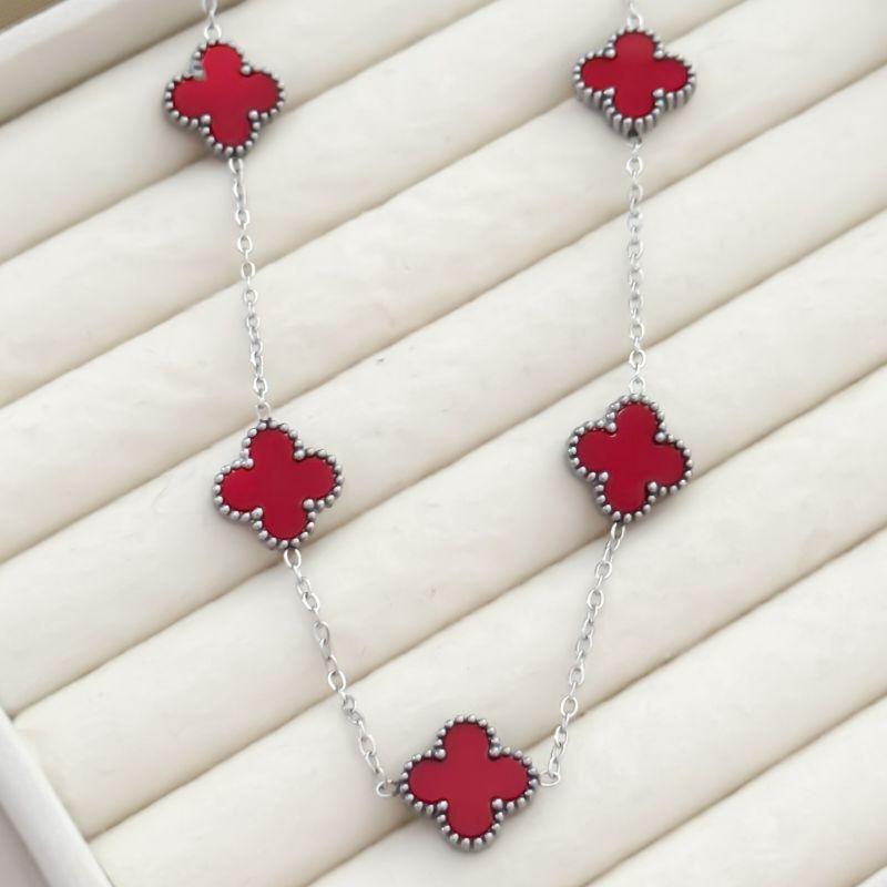 PR CK TREVO VERMEL AÇO